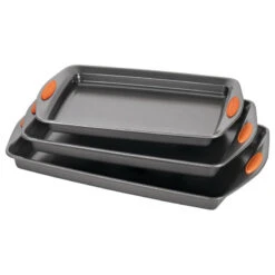 Yum-O! Nonstick 3-Piece Oven Lovin' Cookie Pan Set, Gray, Orange Silicone Grips